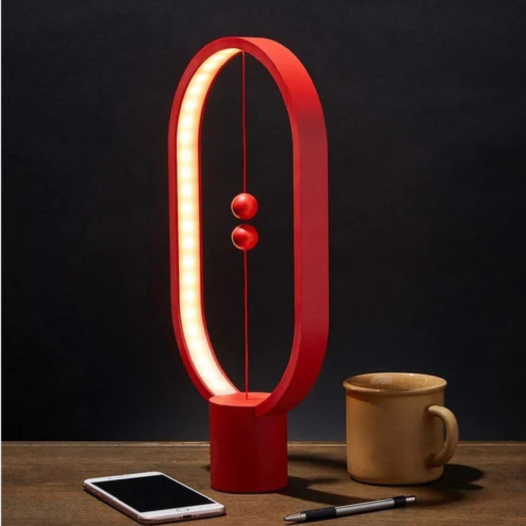 Heng Balance Lamp Ellipse - O lampă unică cu un întrerupător plutitor